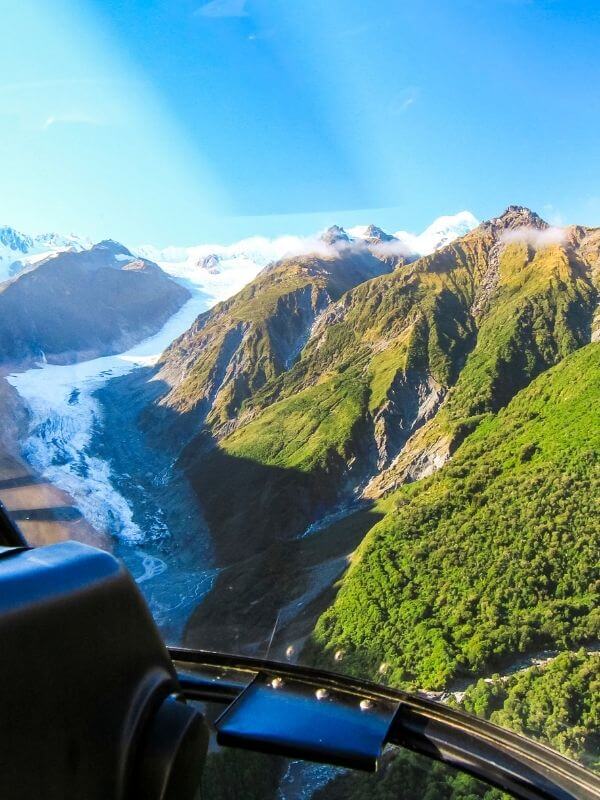 View from cockpit as it flies over Fox Glacier